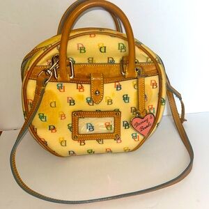 Vintage Dooney & Bourke
Round Bag with Handles / Crossover Strap Yellow